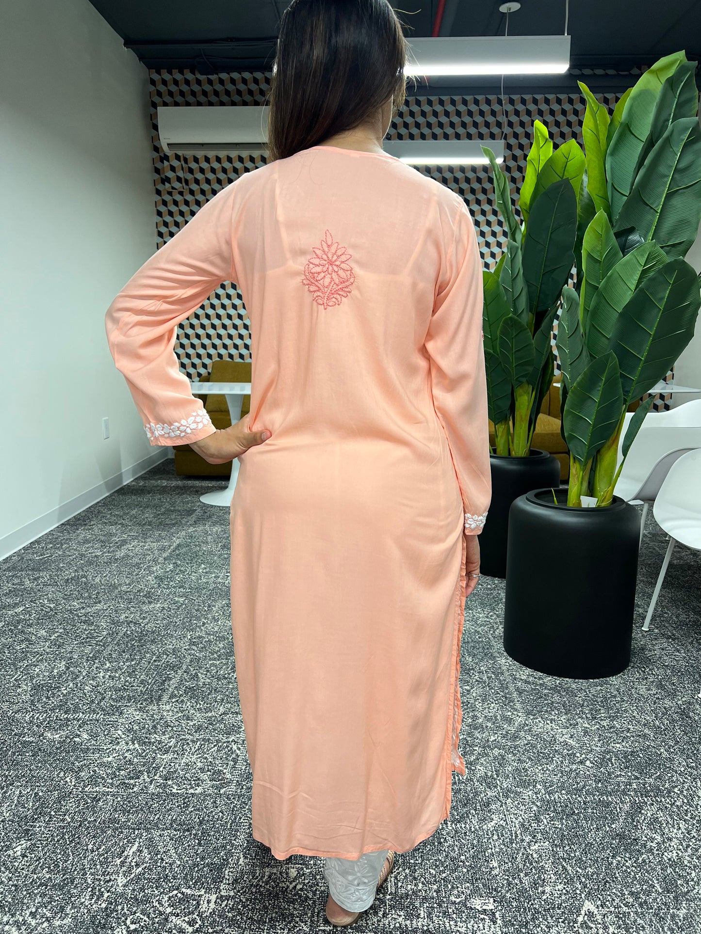 Chikankari floral booti with dark orange thread on kurta back