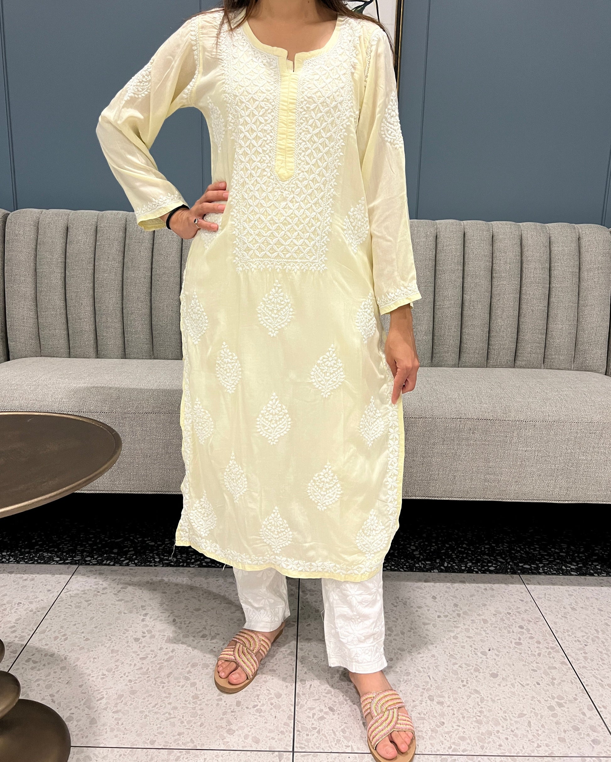 Lemon yellow chikankari kurti in modal fabric with booti design