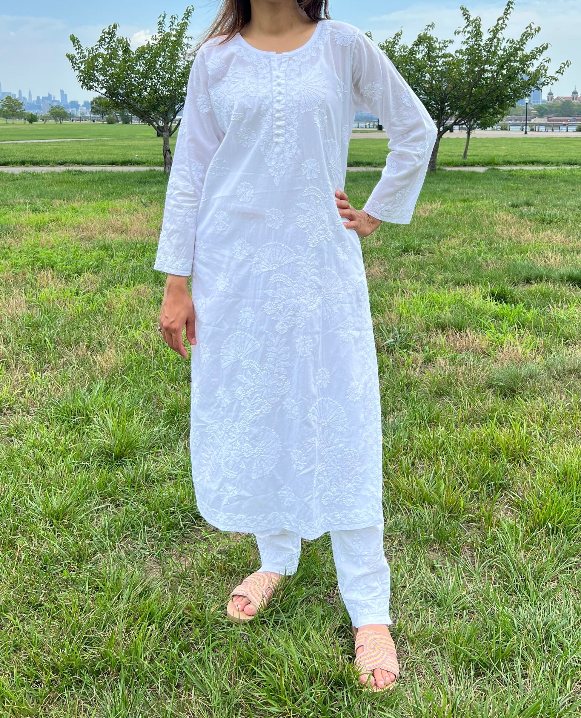 White chikankari kurti with bail design in cotton fabric