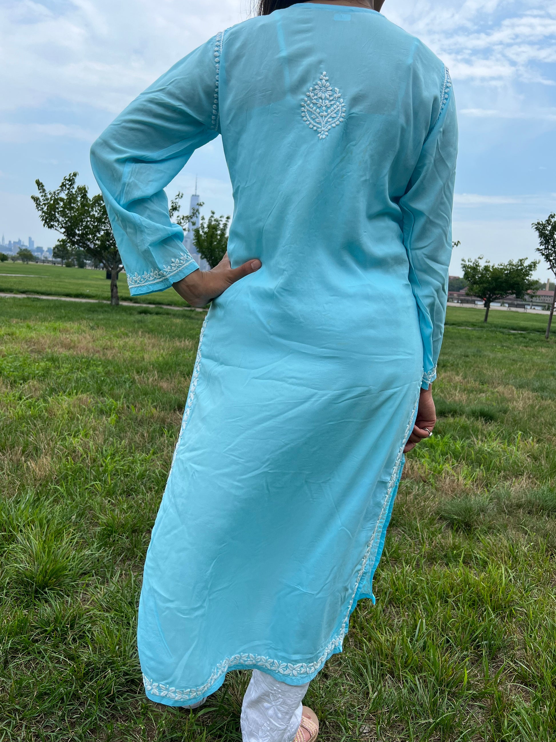 Chikankari booti with white threads on kurta back