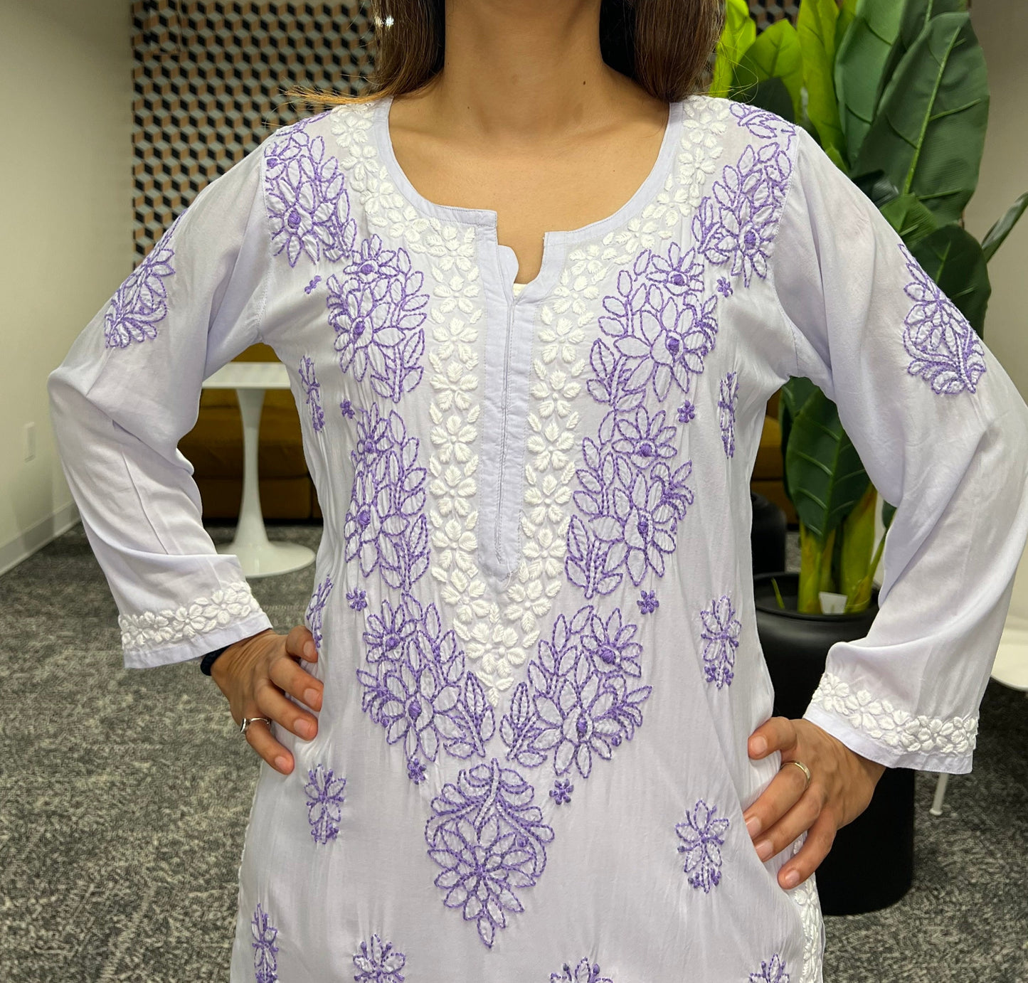 Chikankari floral border in white threads in neckline and floral bail and booti in dark purple threads