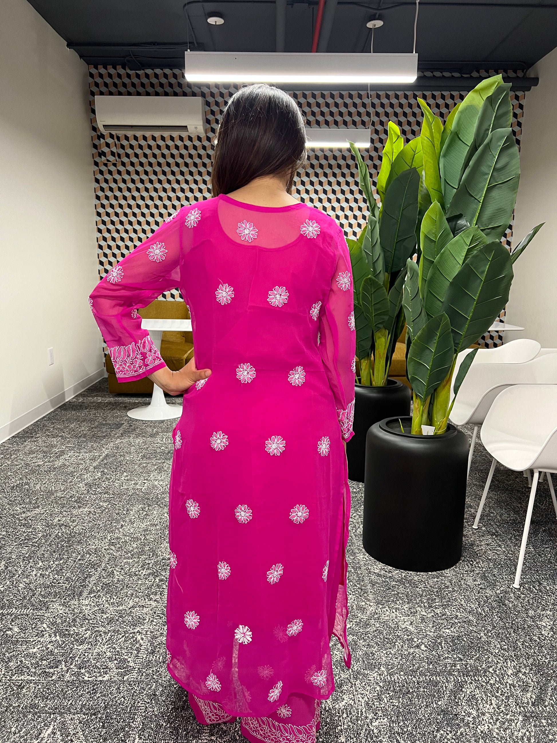 Floral booti chikankari all over the kurti and palazzo set  including the back