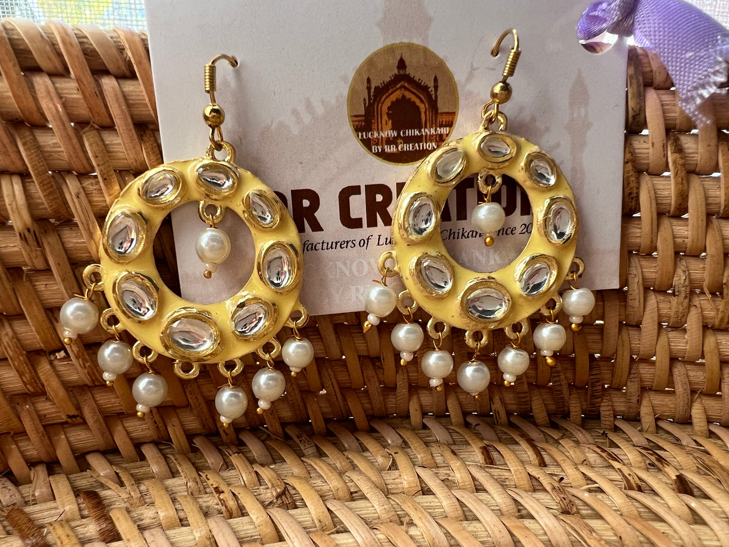 Yellow meenakari and kundan hoops